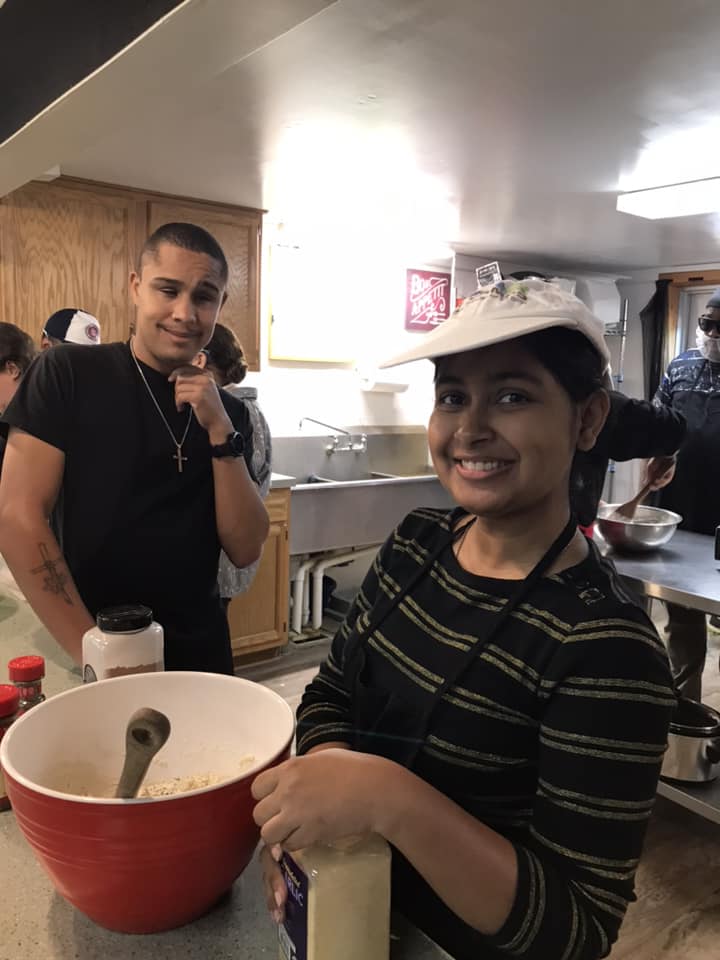 Smiling staff members in the kitchen
