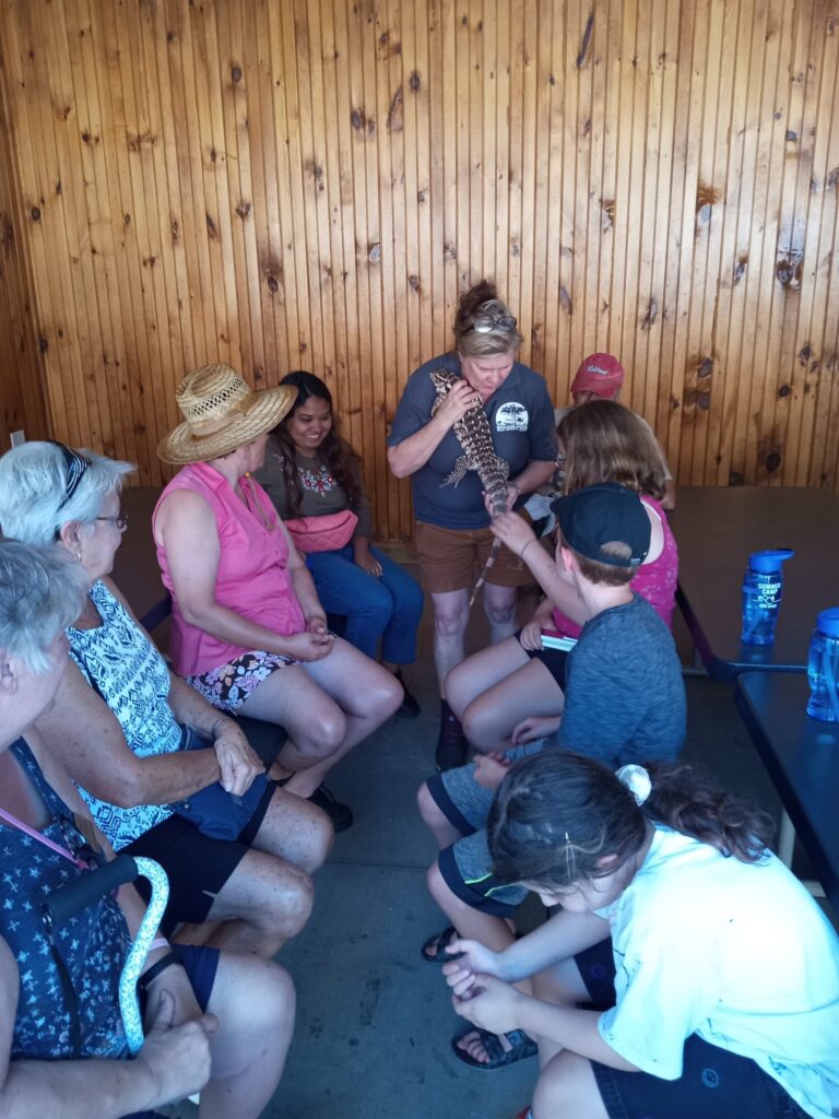 Campers meeting a reptile